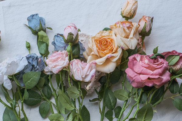 Artificial floral Roses in three